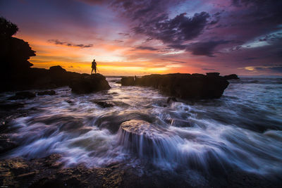 Scenic view of sea against sky during sunset