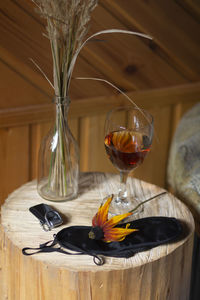 Glass of red wine on table