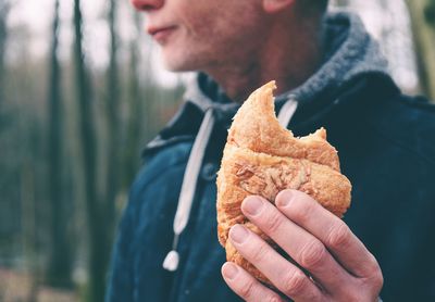 Close-up of man holding ice cream