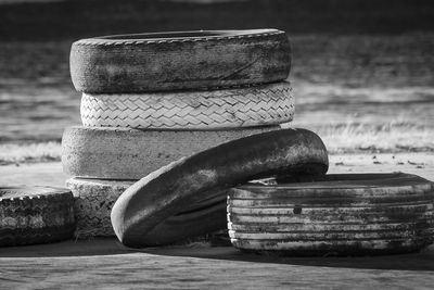 Close-up of stack of boat moored at beach