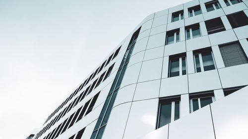 Low angle view of modern building against clear sky