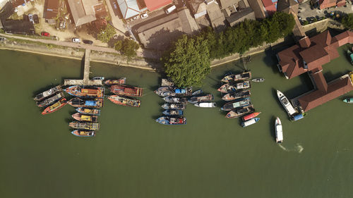 High angle view of canal amidst buildings in city