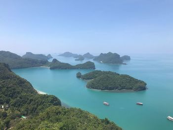 Panoramic view of sea and mountains against sky