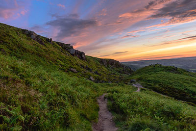 Scenic view of landscape against sky during sunset