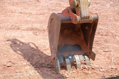 High angle view of old machine part on field