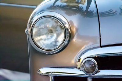 Close-up of vintage car headlight