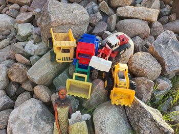 High angle view of toy on rock