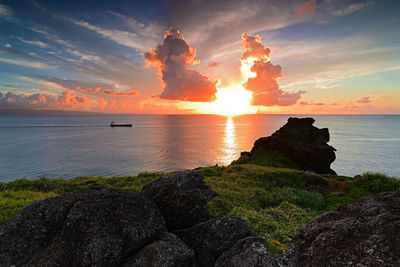 Scenic view of sea against sky during sunset