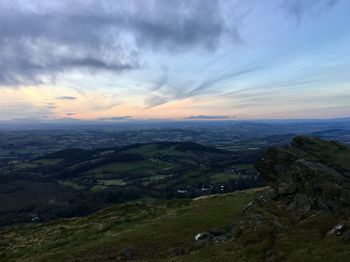 Scenic view of landscape against sky during sunset