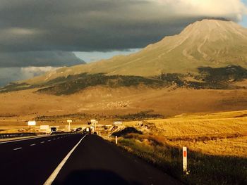 Country road passing through landscape