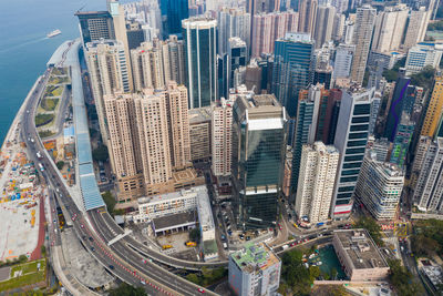 High angle view of buildings in city against sky