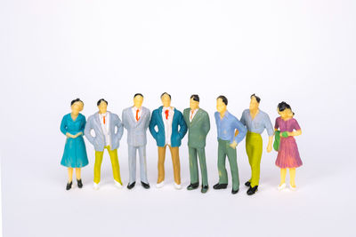 People standing against white background