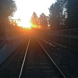 Railroad track at sunset