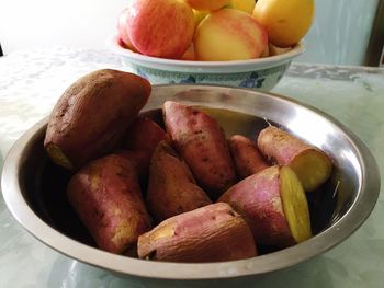 Close-up of fruits in bowl on table