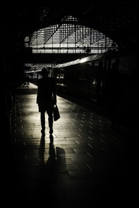 Woman in tunnel