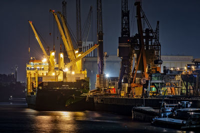 Illuminated commercial dock at night