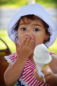 Portrait of cute girl eating ice cream