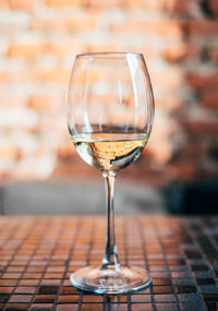 Close-up of wineglass on table