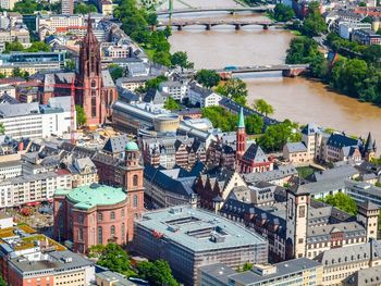 High angle view of city by river