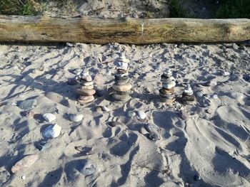 High angle view of stones on snow