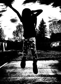 View of people standing in the dark