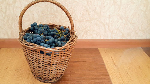 High angle view of fruits in basket on table