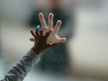 Cropped image of woman looking away