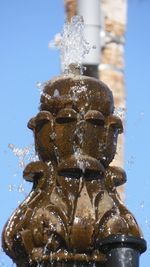 Close-up of statue against sky