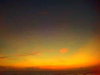 Scenic view of sea against romantic sky at sunset