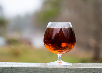 Close-up of beer glass on table