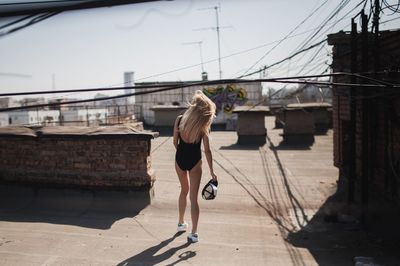 Bikini woman walking outdoors