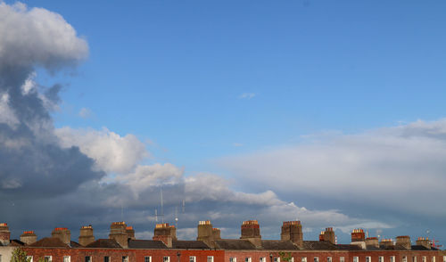 Low angle view of buildings against sky