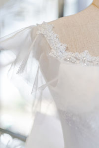 Close-up of white dress