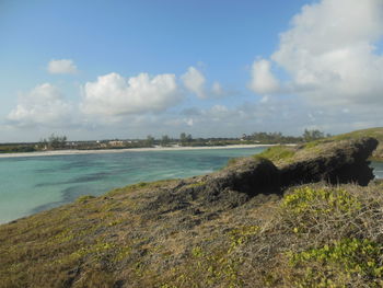 Scenic view of sea against cloudy sky