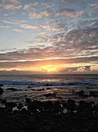 Scenic view of sea at sunset