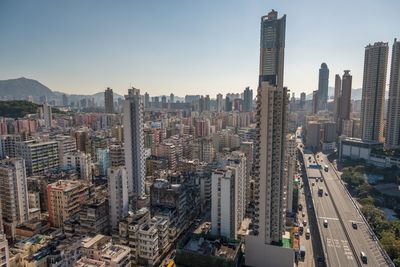 Aerial view of cityscape against sky