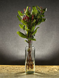 Close-up of flower vase on table