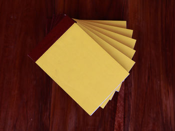 High angle view of paper on table