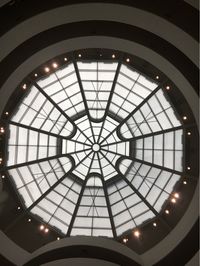 Low angle view of illuminated ceiling