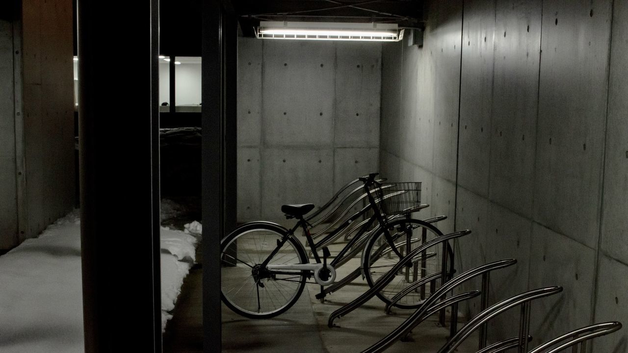 BICYCLE IN PARKING LOT