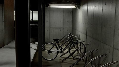 Bicycle parked in front of building