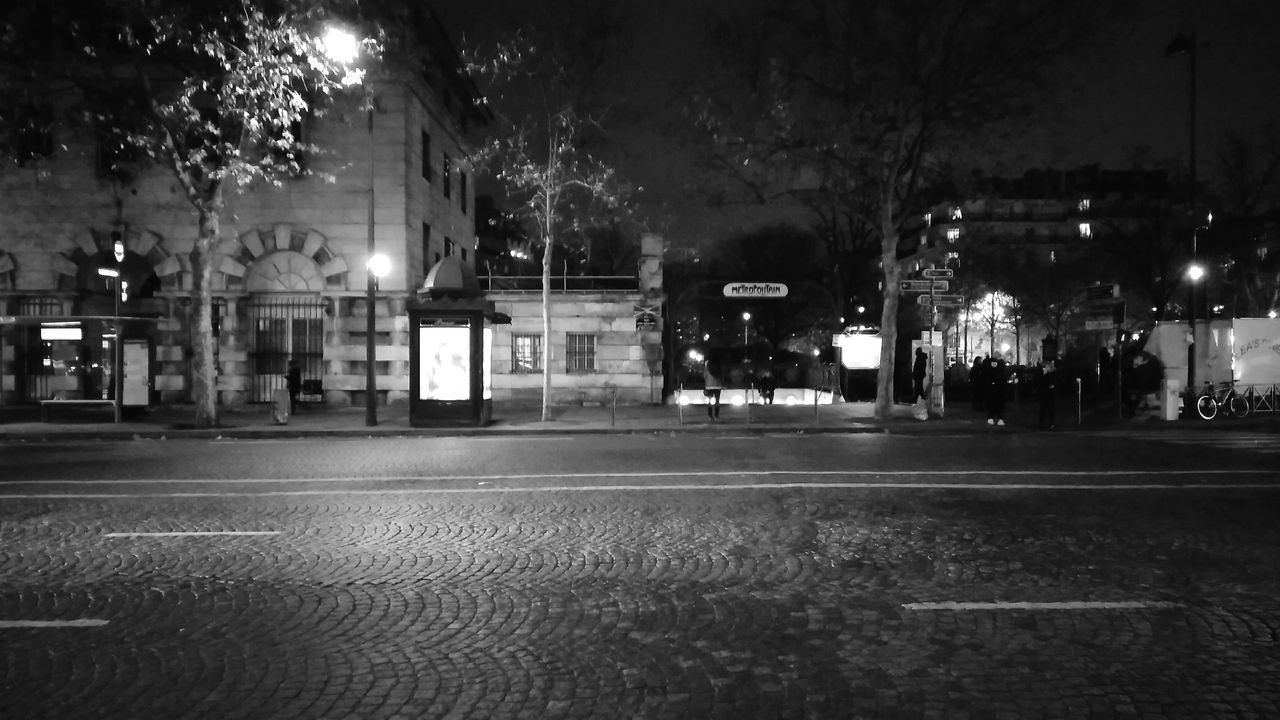 VIEW OF STREET AT NIGHT