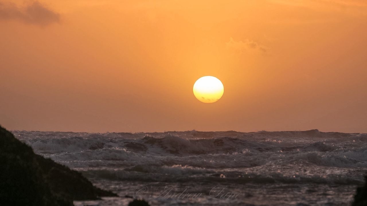 sunset, sun, scenics, tranquil scene, sea, horizon over water, tranquility, beauty in nature, orange color, idyllic, nature, sky, copy space, water, beach, clear sky, remote, moon, non-urban scene, outdoors