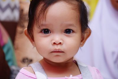 Close-up portrait of cute baby girl