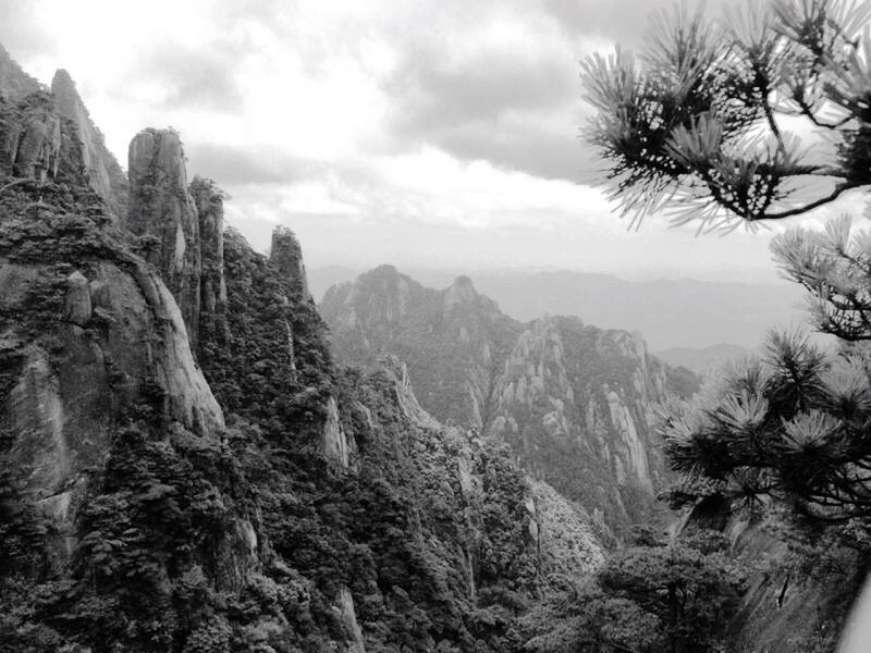 scenics, mountain, tranquil scene, tranquility, sky, rock - object, beauty in nature, rock formation, non-urban scene, nature, physical geography, majestic, tourism, geology, mountain range, cloud - sky, outdoors, cliff, remote, rocky mountains, day, rugged, extreme terrain, natural landmark, eroded