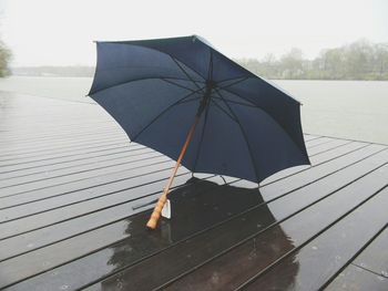 Umbrella on wet deck