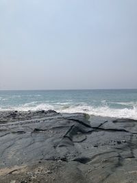 Scenic view of sea against clear sky