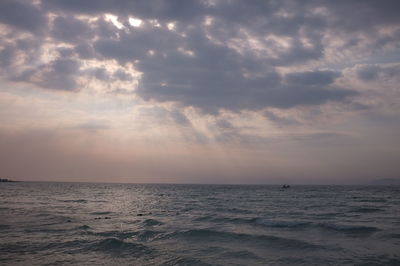 Scenic view of sea against sky at sunset