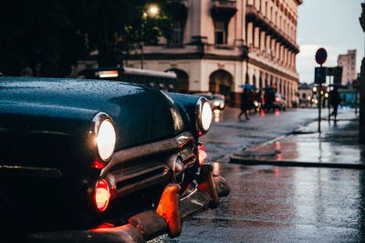 Cars on wet street in rainy season