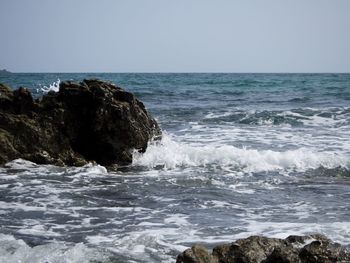 Scenic view of sea against clear sky
